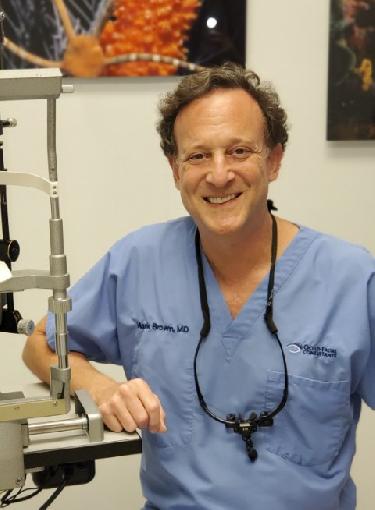 Image of Dr. Mark Brown, a doctor with a stethoscope, smiling